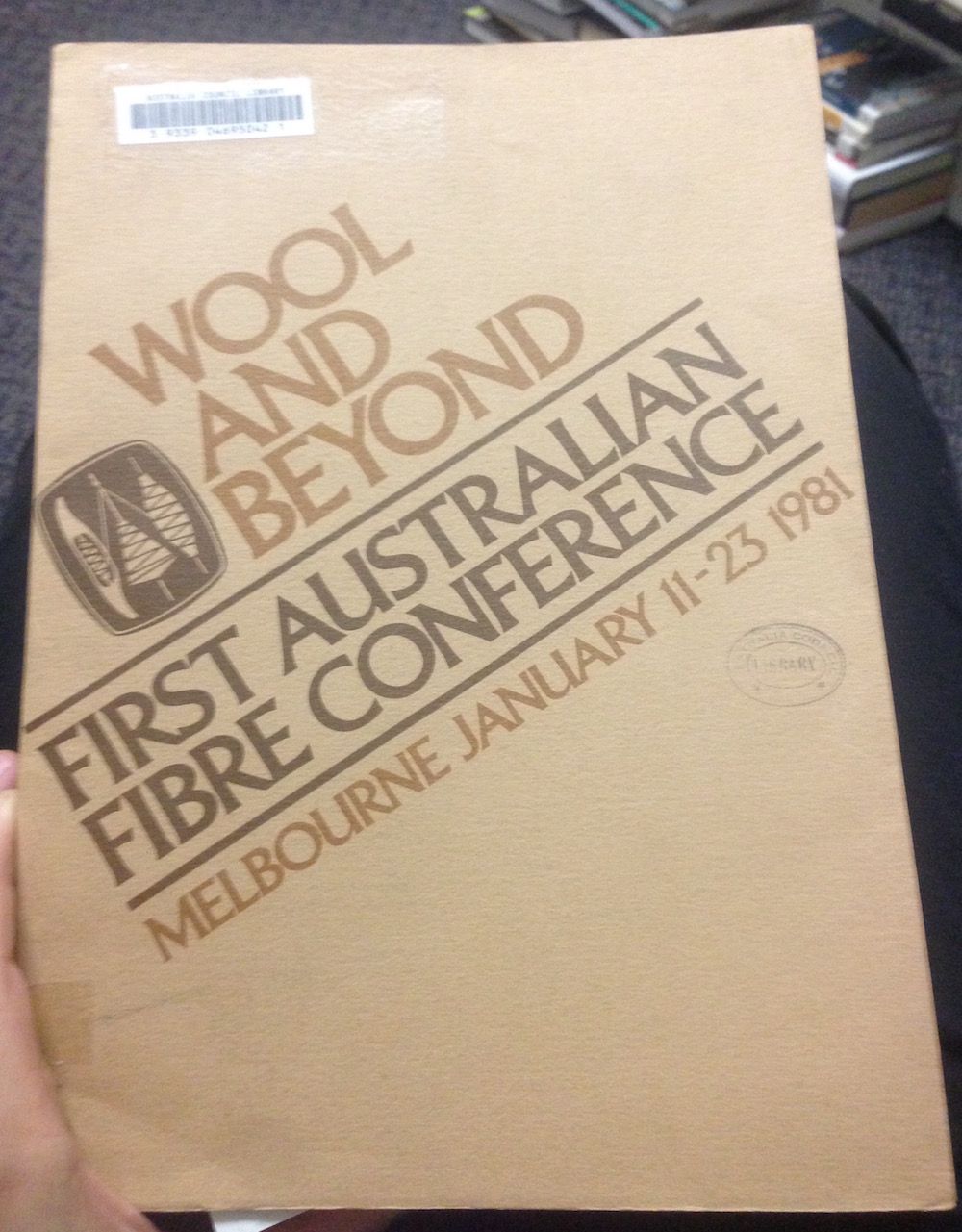 Photograph of the cover of Wool and Beyond: First Australian Fibre Conference: Melbourne January 11-23 1981 (1982)
